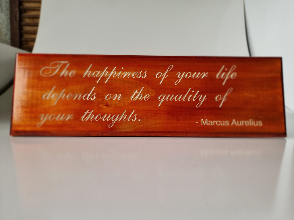Laser engraved timber plaque with Marcus Aurelius motivational quote in elegant script