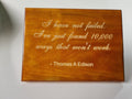 Small laser engraved timber desktop plaque with stand featuring Thomas Edison motivational quote